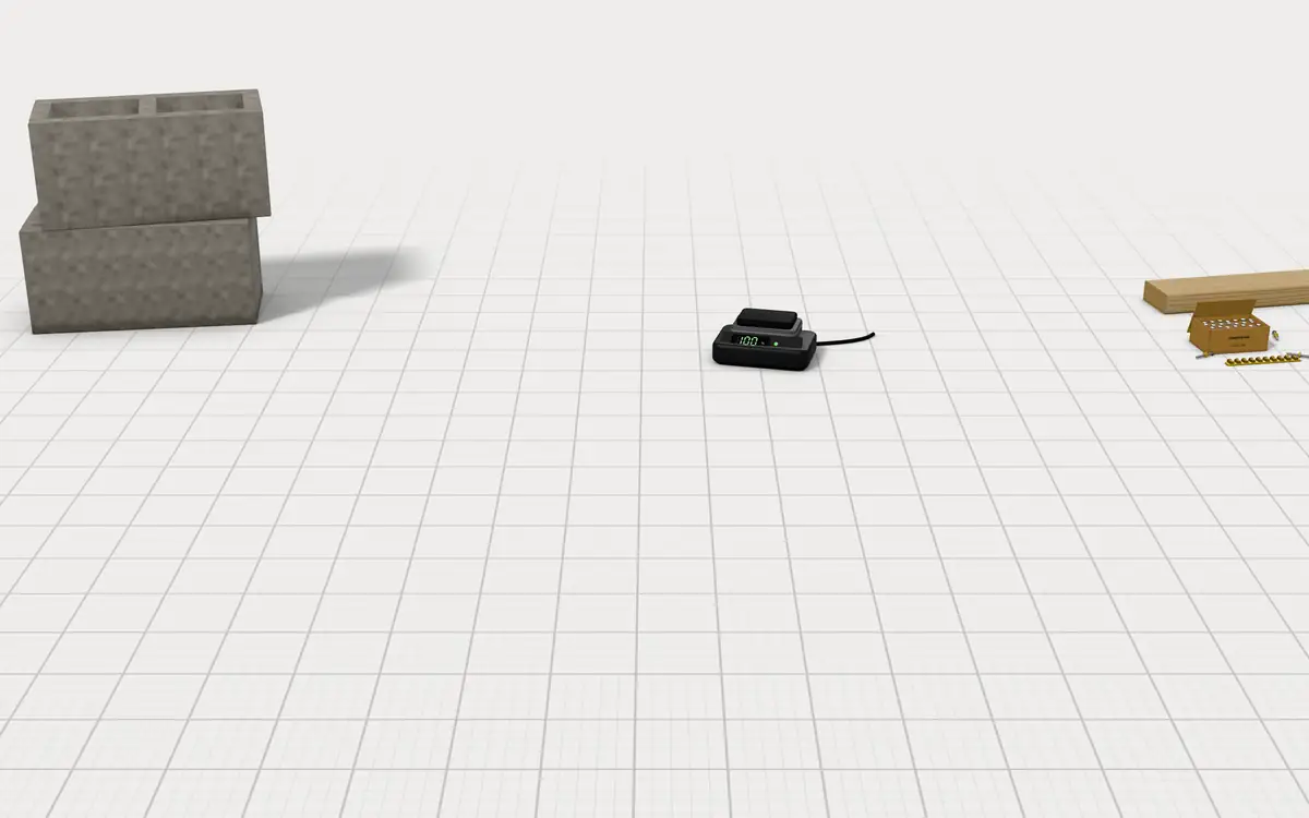 Illustration of the 5 concrete nailers to scale, next to stacked concrete blocks, a 2x4 offcut, a box of concrete pins with a powder-load strip and a battery charger for size